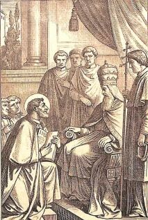 Der heilige Ignatius kniet vor dem Papst, ein Buch in der Hand.