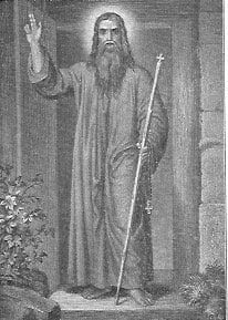 Der heilige Nikolaus von Flüe steht mit seinem Pilgerstab in der linken und dem Segenszeichen der rechten Hand vor der Türe seiner Einsiedelei.