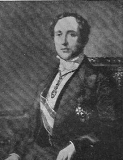 Ein Porträt des großen spanischen Staatsmannes und Philosophen Donoso Cortes, für den Theologie Wissenschaft in Allem ist: er sitzt seitlich, den Kopf zum Betrachter gewendet, edel gekleidet sowie mit Auszeichnungen geschmückt