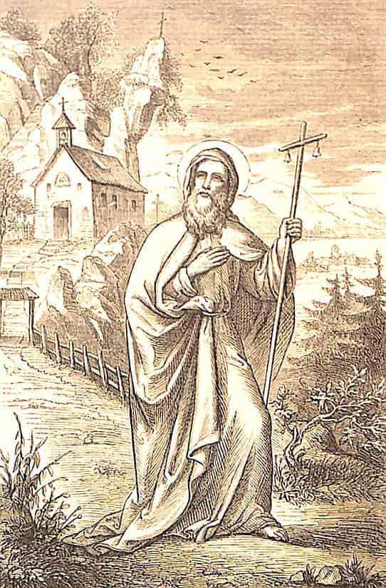 Der heilige Einsiedler Antonius geht in seinem Mönchsgewand, den Pilgerstab in der linken Hand, auf dem Weg von seiner Einsiedelei weg.