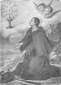 Der heilige Paschalis kniet in seinem Mönchsgewand auf dem Boden, vor ihm liegt der Reisestock und der Hut.